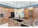Gourmet kitchen with marble countertops, custom cabinetry, and open layout for entertaining at 2824 Old Drake Dr, Seabrook Island, SC 29455