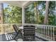 Outdoor patio featuring a table and chairs with a treed view at 2824 Old Drake Dr, Seabrook Island, SC 29455