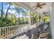 Spacious porch with comfortable seating, offering picturesque views of the surrounding nature at 2824 Old Drake Dr, Seabrook Island, SC 29455