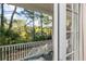 Scenic view from a porch overlooking lush trees and a serene body of water at 2824 Old Drake Dr, Seabrook Island, SC 29455