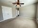 Bedroom with closet, carpet, a ceiling fan, and abundant natural lighting at 3072 Adventure Way, Ladson, SC 29456
