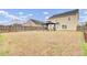 Large backyard with a gazebo and wood fence, perfect for outdoor entertaining and Gathering activities at 315 Bradley Bend Dr, Moncks Corner, SC 29461