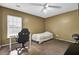 Bedroom featuring a ceiling fan, a large window, a desk, and a bed perfect for study and relaxation at 315 Bradley Bend Dr, Moncks Corner, SC 29461