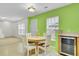Eat-in kitchen featuring modern appliances, a wine cooler, and a round dining table at 315 Bradley Bend Dr, Moncks Corner, SC 29461