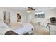 A cozy main bedroom with a view of the bathroom and a large flat-screen television at 315 Bradley Bend Dr, Moncks Corner, SC 29461