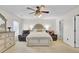 Cozy main bedroom featuring a ceiling fan, a decorative bed frame, and plush seating at 315 Bradley Bend Dr, Moncks Corner, SC 29461