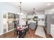 A kitchen with a dining space including a glass-topped table and stainless steel appliances at 3388 Forest Glen Dr, Charleston, SC 29414