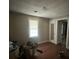 Modest bedroom featuring a window and doorway, showcasing the room's potential and layout at 3657 Santee River Rd, Saint Stephen, SC 29479