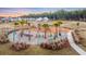 Elevated daytime view of community playground with picnic tables and seating at 379 Oak Park St, Summerville, SC 29486