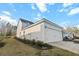 Exterior showcases a two-story layout with a attached two-car garage, offering plenty of space for vehicles at 3933 Bessemer Rd, Mount Pleasant, SC 29466