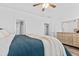 Bright bedroom with a ceiling fan, ensuite bath, and wood furniture at 3933 Bessemer Rd, Mount Pleasant, SC 29466
