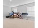Versatile bonus room provides ample space for a home office, play area, or hobby center with natural light at 3933 Bessemer Rd, Mount Pleasant, SC 29466