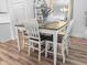 Bright dining area with modern decor, a large mirror, and stylish furnishing creates an inviting space for entertaining at 3933 Bessemer Rd, Mount Pleasant, SC 29466