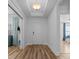 Inviting entryway showcasing wood floors, recessed lighting, and access to other rooms at 3933 Bessemer Rd, Mount Pleasant, SC 29466