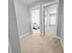 Hallway with carpet flooring leading to bedroom with natural light at 3933 Bessemer Rd, Mount Pleasant, SC 29466