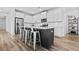 Open concept kitchen featuring an island with seating, stainless appliances, and modern finishes at 3933 Bessemer Rd, Mount Pleasant, SC 29466