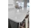 Close-up of kitchen island with a quartz countertop and seating at 3933 Bessemer Rd, Mount Pleasant, SC 29466