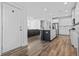 Bright and airy kitchen with white cabinets, stainless steel appliances, and a stylish island for meal preparation at 3933 Bessemer Rd, Mount Pleasant, SC 29466