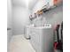 Bright laundry room with tile floors, shelving, washer, and dryer at 3933 Bessemer Rd, Mount Pleasant, SC 29466