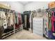 Organized walk-in closet with shelves, rods, and a dresser for ample storage at 3933 Bessemer Rd, Mount Pleasant, SC 29466