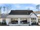 Expansive backyard with covered patio, perfect for outdoor living at 3949 Bulow Landing Rd, Ravenel, SC 29470