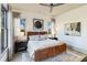 Comfortable bedroom features a unique leather bedframe and stylish decor at 3949 Bulow Landing Rd, Ravenel, SC 29470