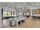 Spacious living area combines the kitchen, dining, and living room featuring an open concept design with hardwood floors at 3949 Bulow Landing Rd, Ravenel, SC 29470