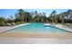 Spacious community pool with beach entry, sunning deck, and room to lounge at 3949 Bulow Landing Rd, Ravenel, SC 29470