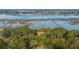 An elevated aerial view showing the property and surrounding woods and marsh areas at 3970 Betsy Kerrison Pkwy, Johns Island, SC 29455