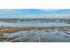 Expansive aerial view of a waterway with docks and beautiful marshland at 3970 Betsy Kerrison Pkwy, Johns Island, SC 29455