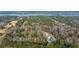 High angle aerial view showcases lots of trees surrounding the property including long waterway at 3970 Betsy Kerrison Pkwy, Johns Island, SC 29455