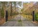 Elegant wrought iron gate at the entrance to a private estate driveway at 3970 Betsy Kerrison Pkwy, Johns Island, SC 29455