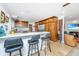 An open kitchen design with marble countertops, breakfast bar seating, and stainless steel appliances at 3970 Betsy Kerrison Pkwy, Johns Island, SC 29455