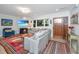 Inviting living room featuring a fireplace, comfortable seating, and an abundance of natural light at 3970 Betsy Kerrison Pkwy, Johns Island, SC 29455