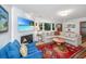 Comfortable living room featuring a fireplace, plush seating, and an abundance of natural light at 3970 Betsy Kerrison Pkwy, Johns Island, SC 29455