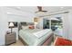 Relaxing main bedroom with a sliding glass door to the patio and pool area at 3970 Betsy Kerrison Pkwy, Johns Island, SC 29455