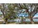 Picturesque marsh view of a wooden dock and bridge framed by majestic trees and tranquil waters at 3970 Betsy Kerrison Pkwy, Johns Island, SC 29455