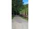 Gravel path runs alongside a rustic fence and palm trees at 3970 Betsy Kerrison Pkwy, Johns Island, SC 29455
