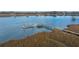 Waterfront view featuring a private dock and pier extending into the tranquil river at 3970 Betsy Kerrison Pkwy, Johns Island, SC 29455