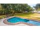 Relaxing backyard pool area featuring lush greenery, perfect for outdoor enjoyment and recreation at 3970 Betsy Kerrison Pkwy, Johns Island, SC 29455