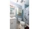 Neat bathroom featuring a vanity with sink, toilet, and tub/shower combo with a neutral-toned shower curtain at 40 Bee Street # 314, Charleston, SC 29403