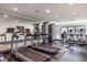 Bright gym with treadmills, weight machines, and mirrored wall for a complete fitness experience at 40 Bee Street # 314, Charleston, SC 29403