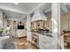 An open-concept kitchen seamlessly connects to the living space, offering modern appliances and stylish design at 40 New St, Charleston, SC 29401