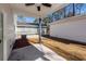 View of a covered back porch offering a relaxing outdoor space with views of the yard and neighboring house at 405 Simmons Ave, Summerville, SC 29483