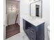 This bathroom features a sleek vanity with a modern mirror and elegant marble flooring at 405 Simmons Ave, Summerville, SC 29483