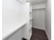 Organized closet with built-in shelving and ample storage space, complimented by wood-look flooring at 405 Simmons Ave, Summerville, SC 29483