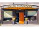 Exterior of a restaurant with a welcoming entrance, decorative plants, and visible storefront windows at 4111 Rising Tide Dr, Summerville, SC 29485