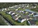 Beautiful aerial view of the community with lush greenery and scenic pond at 4179 Rising Tide Dr, Summerville, SC 29485