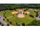 Aerial view of multiple baseball fields with manicured green grass and mature trees surrounding the complex at 4179 Rising Tide Dr, Summerville, SC 29485