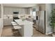 Modern kitchen featuring stainless steel appliances and a spacious island with seating at 4179 Rising Tide Dr, Summerville, SC 29485